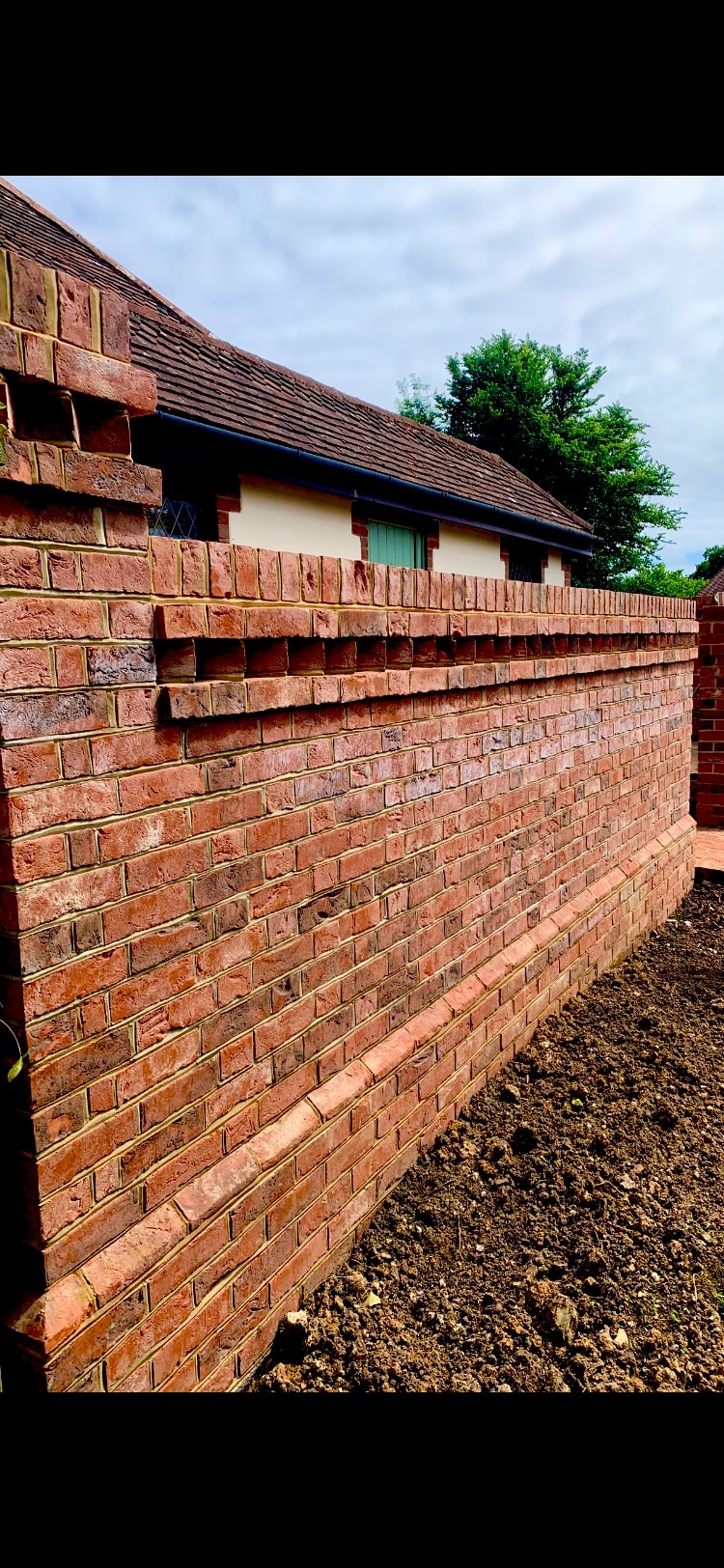 Mortar repair work on weathered brickwork